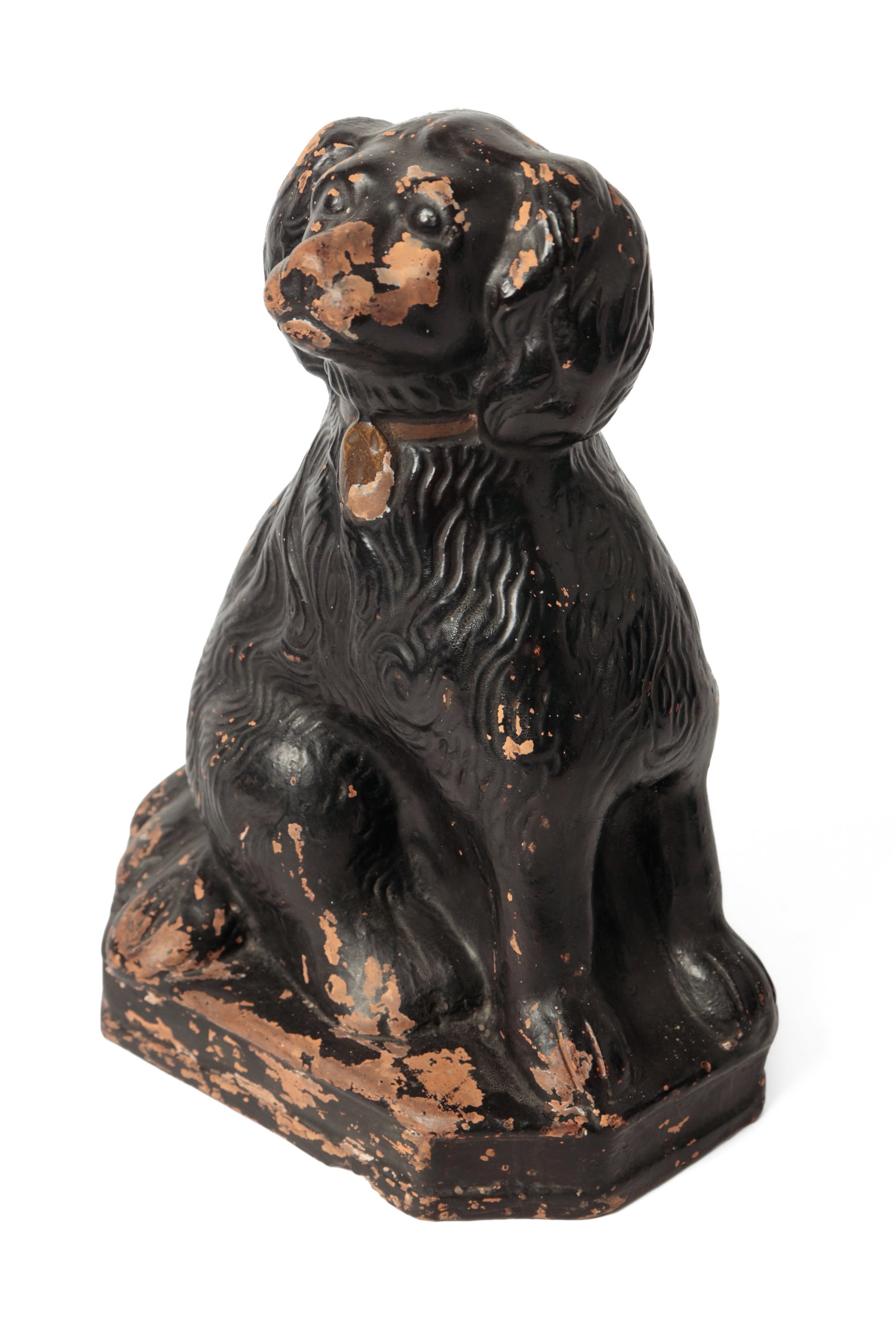 FINELY MOLDED RED CLAY SEATED SPANIEL.: FINELY MOLDED RED CLAY SEATED SPANIEL. American, late 19th or early 20th Century. Hollow-body spaniel with textured coat, closed front legs, gold-painted collar with lock, and seated on an octagonal p