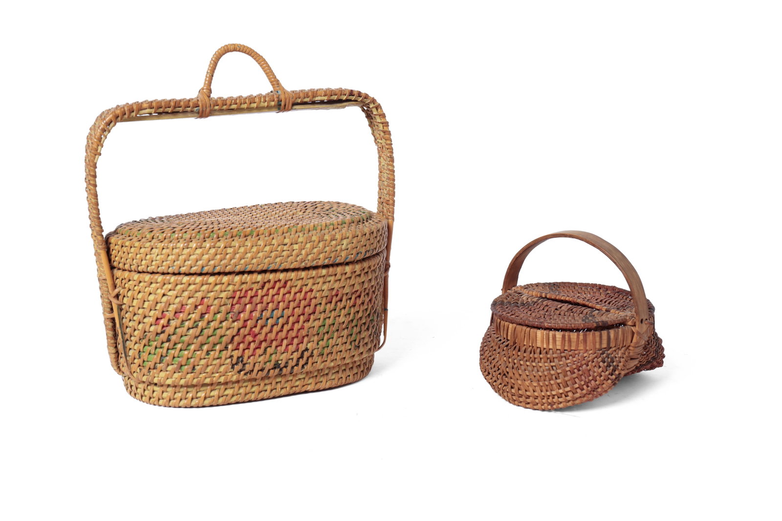TWO LIDDED BASKETS.: TWO LIDDED BASKETS. American, late 19th or early 20th Century. A tall handled, lozenge-shaped basket with painted flower decoration and woven rattan throughout. Overall, 10â€h. 9.25&#
