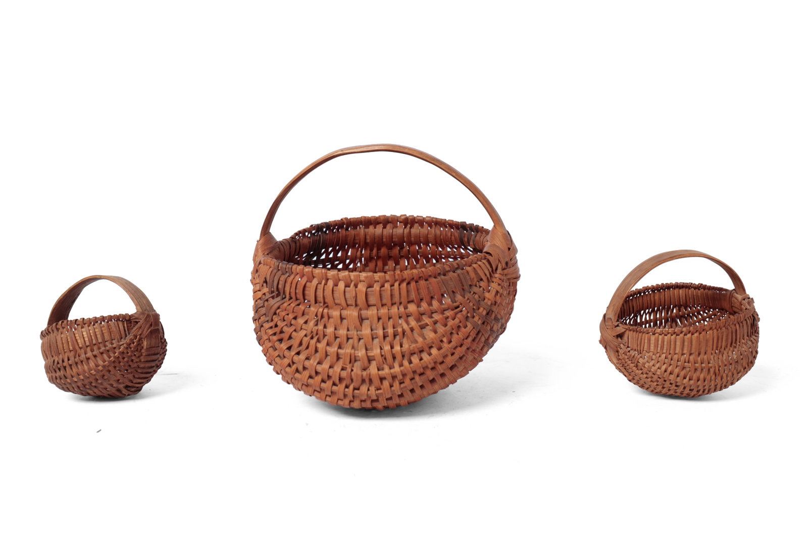 THREE DIMINUTIVE AND MINIATURE BUTTOCKS BASKETS. (1 of 16)