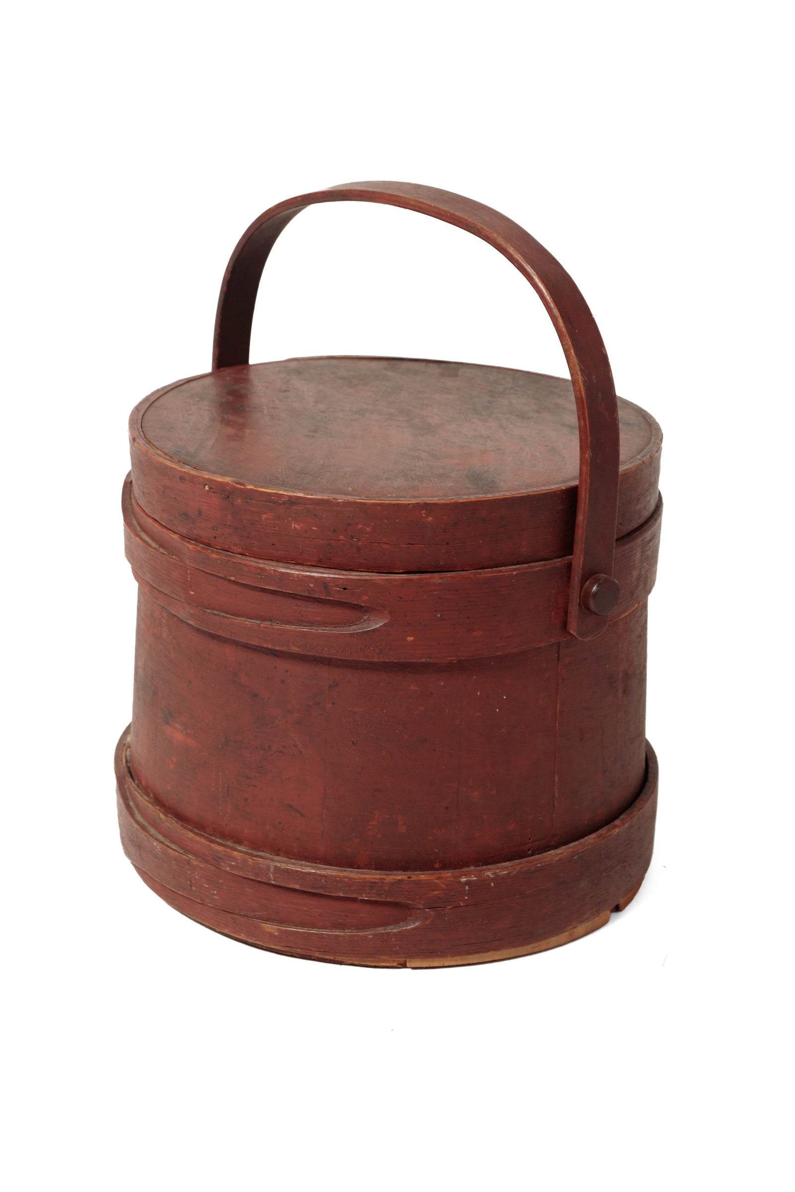 LARGE FIRKIN WITH ORIGINAL RED PAINT.: LARGE FIRKIN WITH ORIGINAL RED PAINT. American, mid- 19th Century. Pine. Stave constructed with canted sides, oak hoops with finger joints, and an oak bale handle. 12.5"h. 14.5"d.