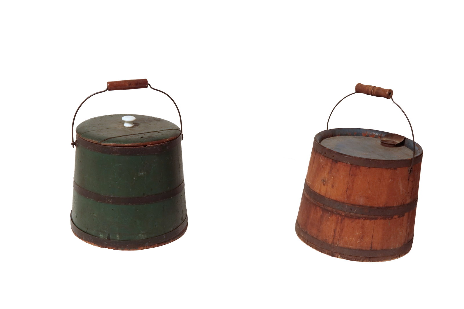 TWO STAVED BUCKETS IN ORIGINAL PAINT.: TWO STAVED BUCKETS IN ORIGINAL PAINT. American, 19th Century. Molasses bucket with iron bands, bail handle, tinned iron spout with old cork stopper, with original blue paint. 9.5"h. 12"d. New
