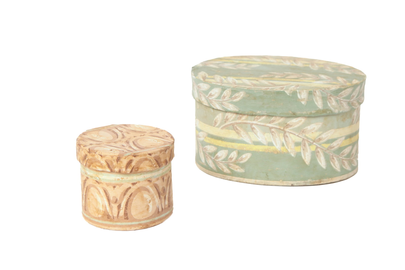 TWO DIMINUTIVE WALLPAPER BAND BOXES.: TWO DIMINUTIVE WALLPAPER BAND BOXES. American, 19th Century. One of oval form with green, yellow, and white paper with leaf decoration, the interior lined with newspaper. 3.5"h. 6"w. 4.5"d. The other