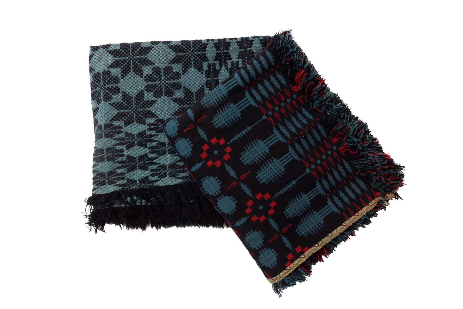 TWO DARK BLUE COVERLETS.: TWO DARK BLUE COVERLETS. American, mid- 19th Century. A jacquard Summer-Winter in two sections, sewn together. Dark blue, light blue, and orange with pine tree border and geometric center, 78"w.
