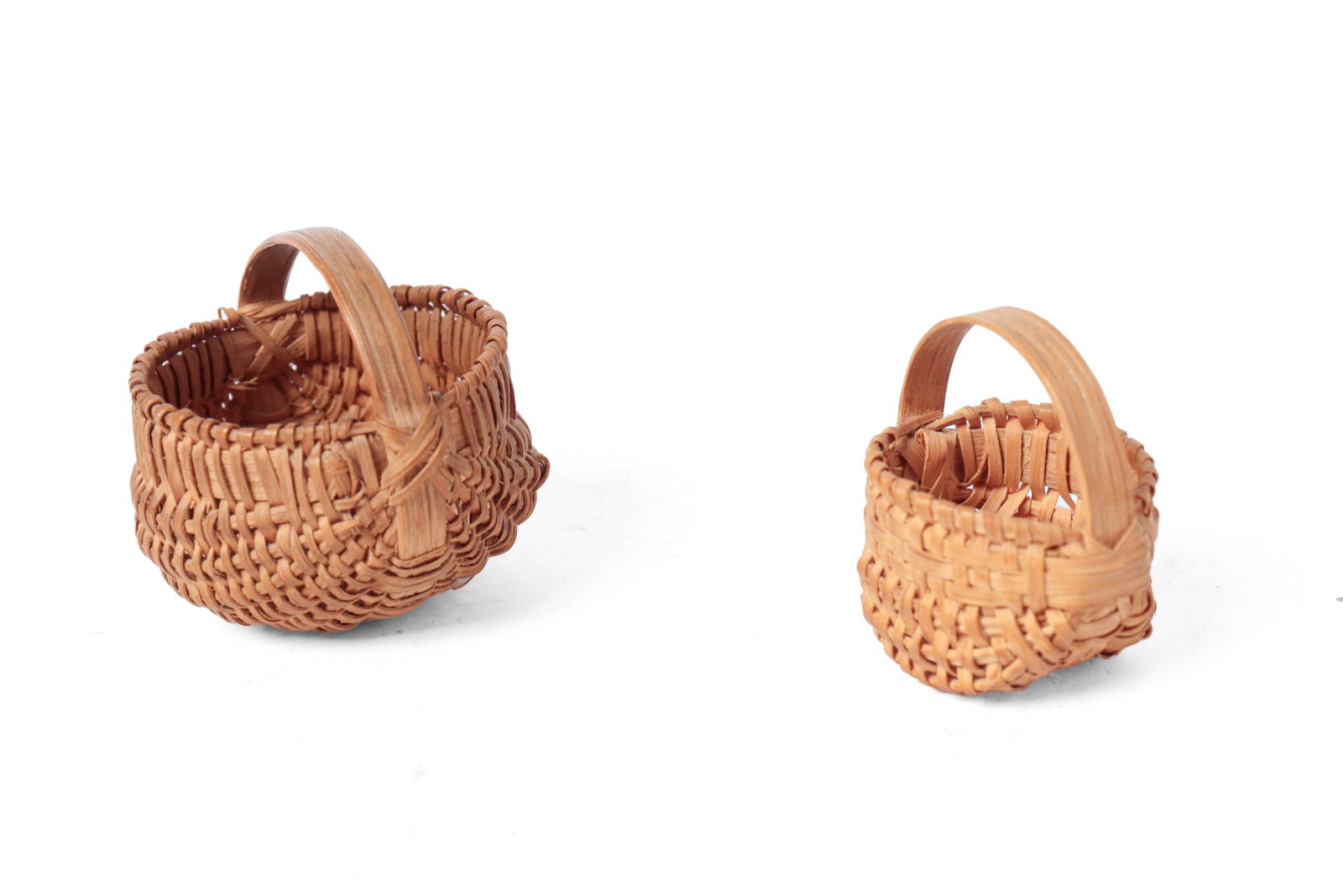 TWO MINIATURE WOVEN SPLIT BUTTOCKS BASKETS. - 2