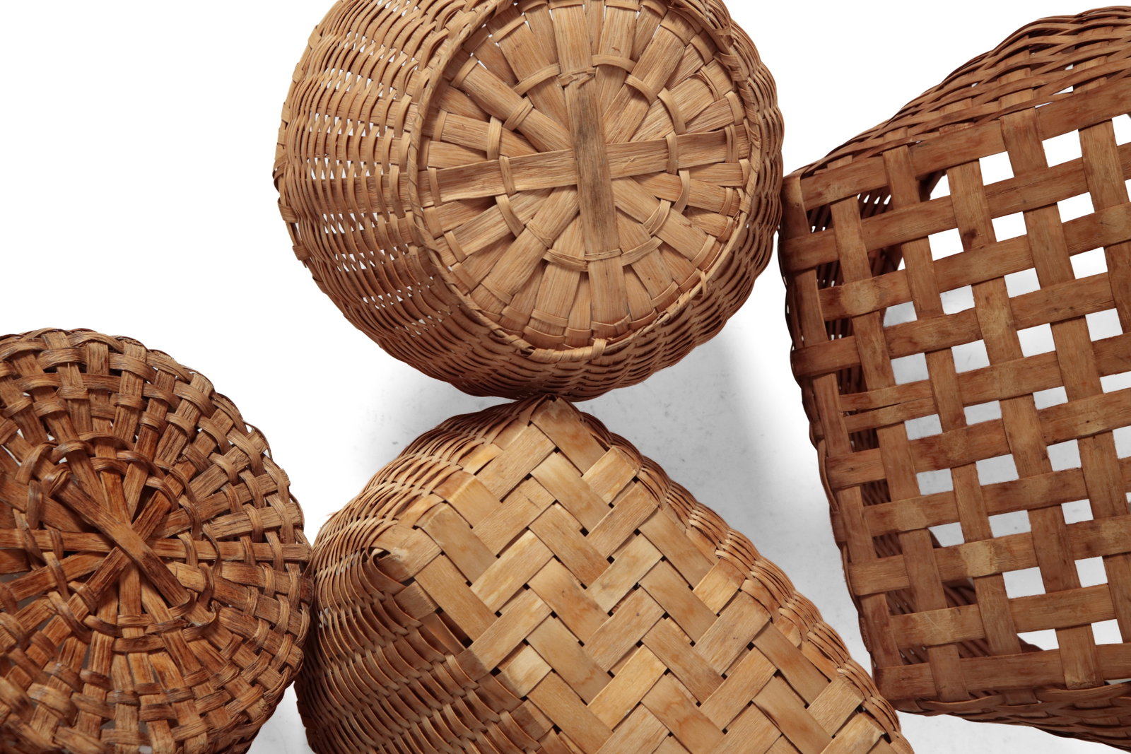 FOUR WOVEN SPLINT BASKETS. - 14