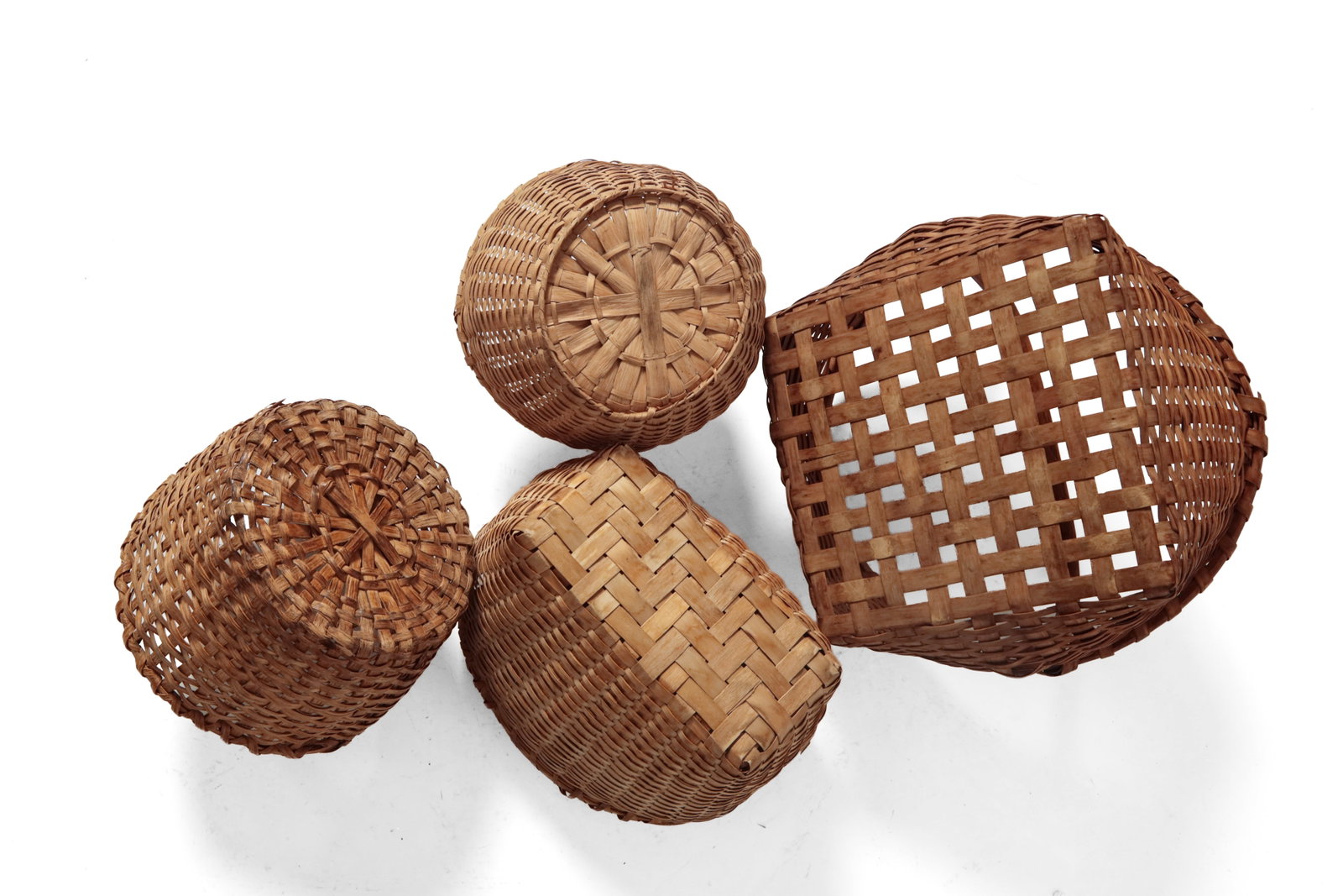 FOUR WOVEN SPLINT BASKETS. - 15