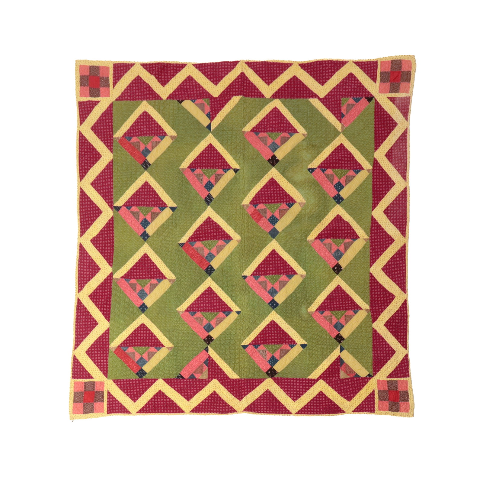 HAND-STITCHED AND PIECED "RISING SUN" QUILT.: HAND-STITCHED AND PIECED "RISING SUN" QUILT. American (Cumberland County, Pennsylvania), late 19th or early 20th Century. Heavily patterned fabrics arranged in the "rising sun" pattern, nine-patch