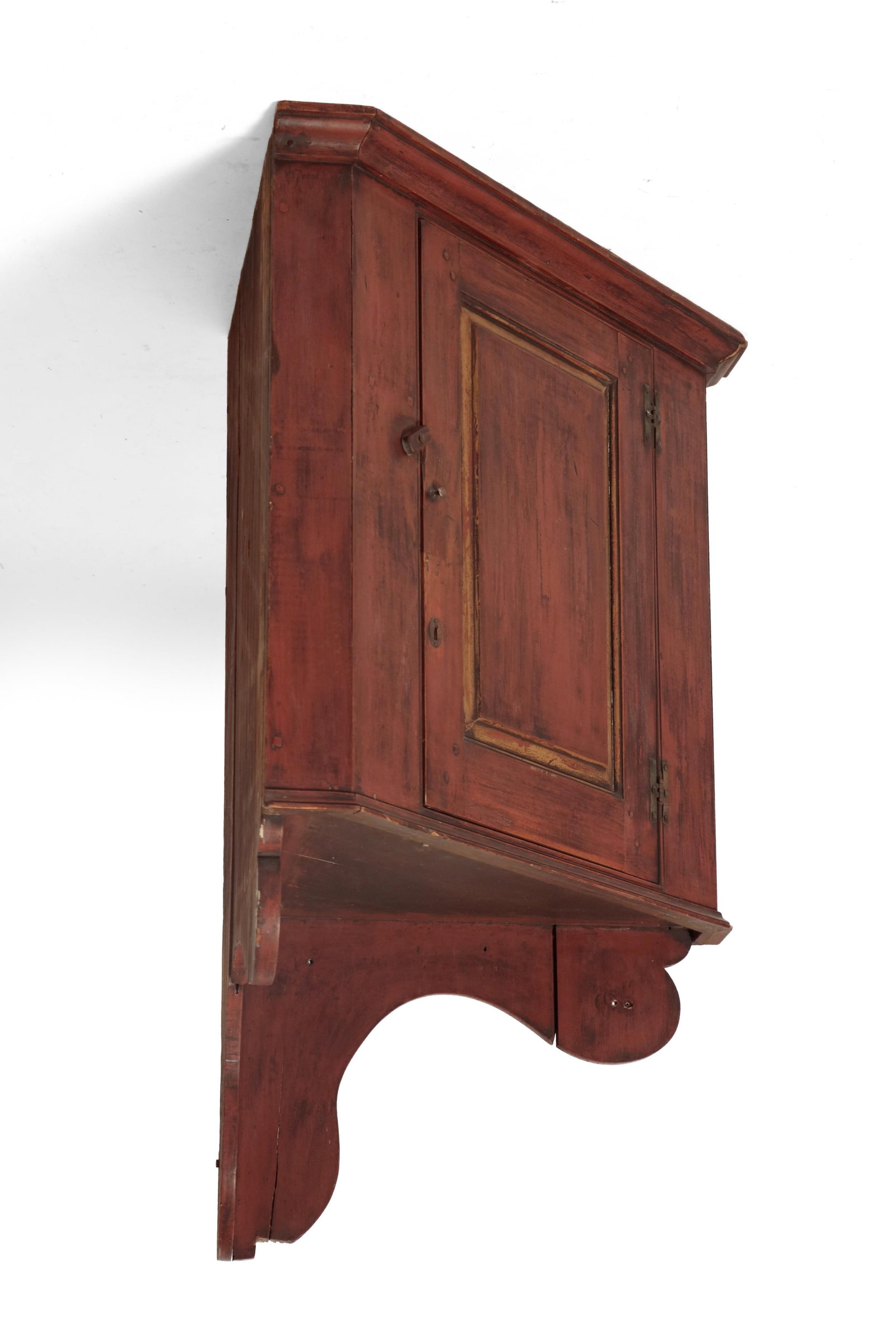HANGING CORNER CUPBOARD WITH REDDISH-BROWN PAINT. (1 of 4)