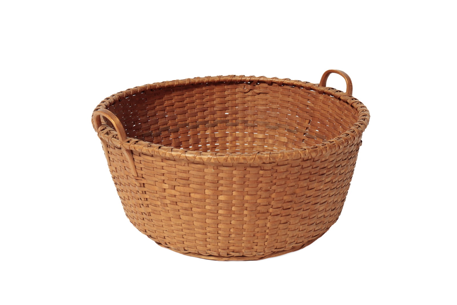 LARGE SHAKER HANDLED BASKET.: LARGE SHAKER HANDLED BASKET. American (Waldoboro, Maine), 19th Century. Circular form basket with tightly woven splints, bentwood finger handles, a line of green splints to the inside, and a wrapped r