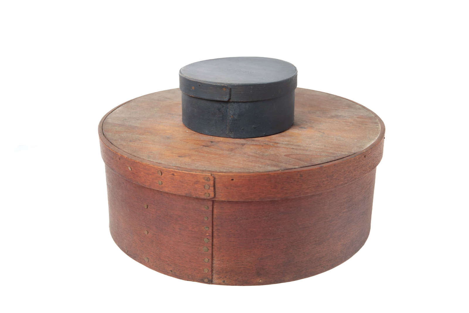 TWO BENTWOOD PANTRY BOXES.: TWO BENTWOOD PANTRY BOXES. American, second half 19th Century. Both are birch and pine, have lap joints and copper tacks. The larger has original dark finish. 6''h. 16.5"d. The smaller has "J.BURR"