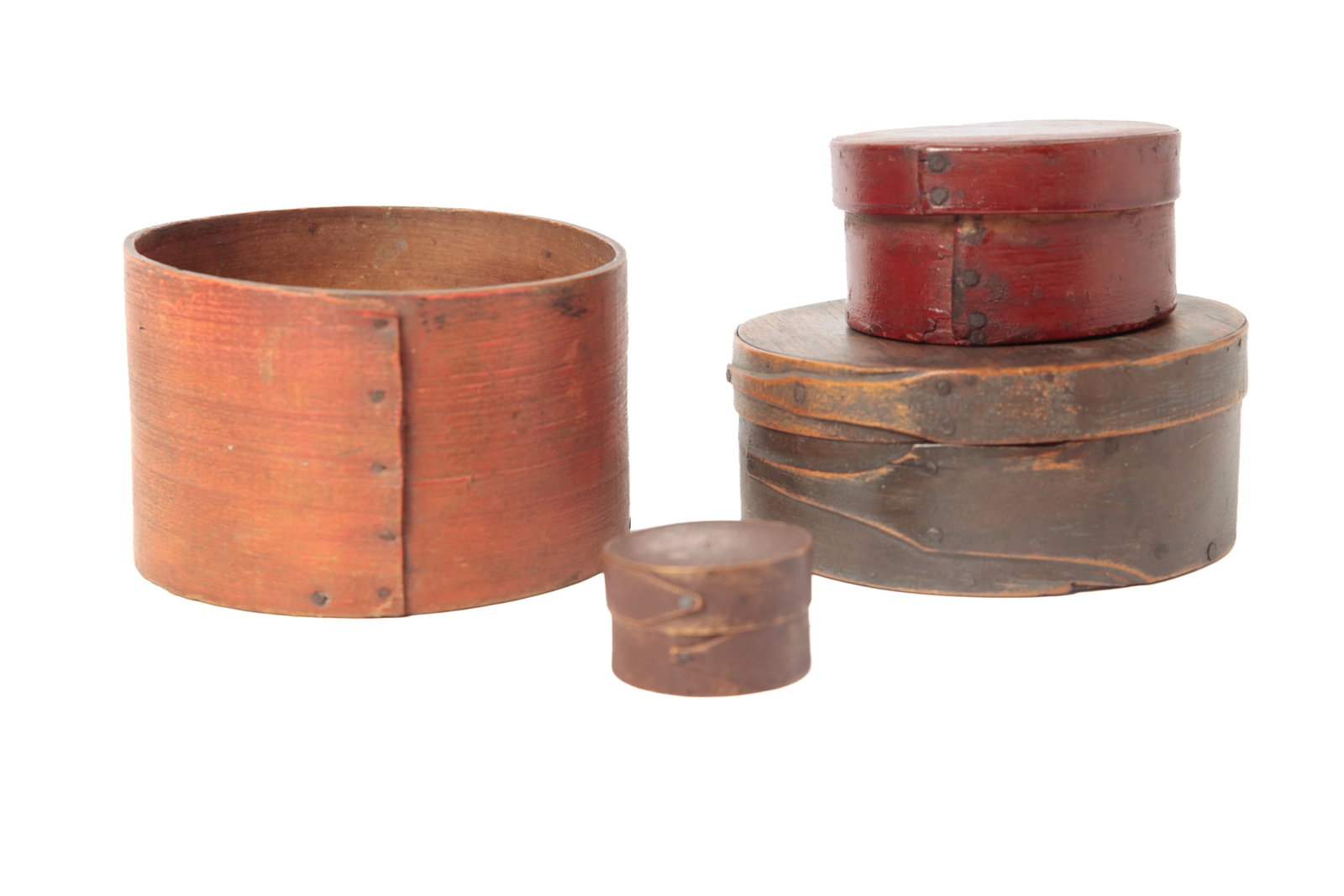 FOUR PAINTED BENTWOOD ITEMS.: FOUR PAINTED BENTWOOD ITEMS. American, 19th Century. A bittersweet-painted bentwood measure with a tacked seam, 3.25"h. 5.5"d.; a round lidded pantry box in old blue and gray paint with finger joints 