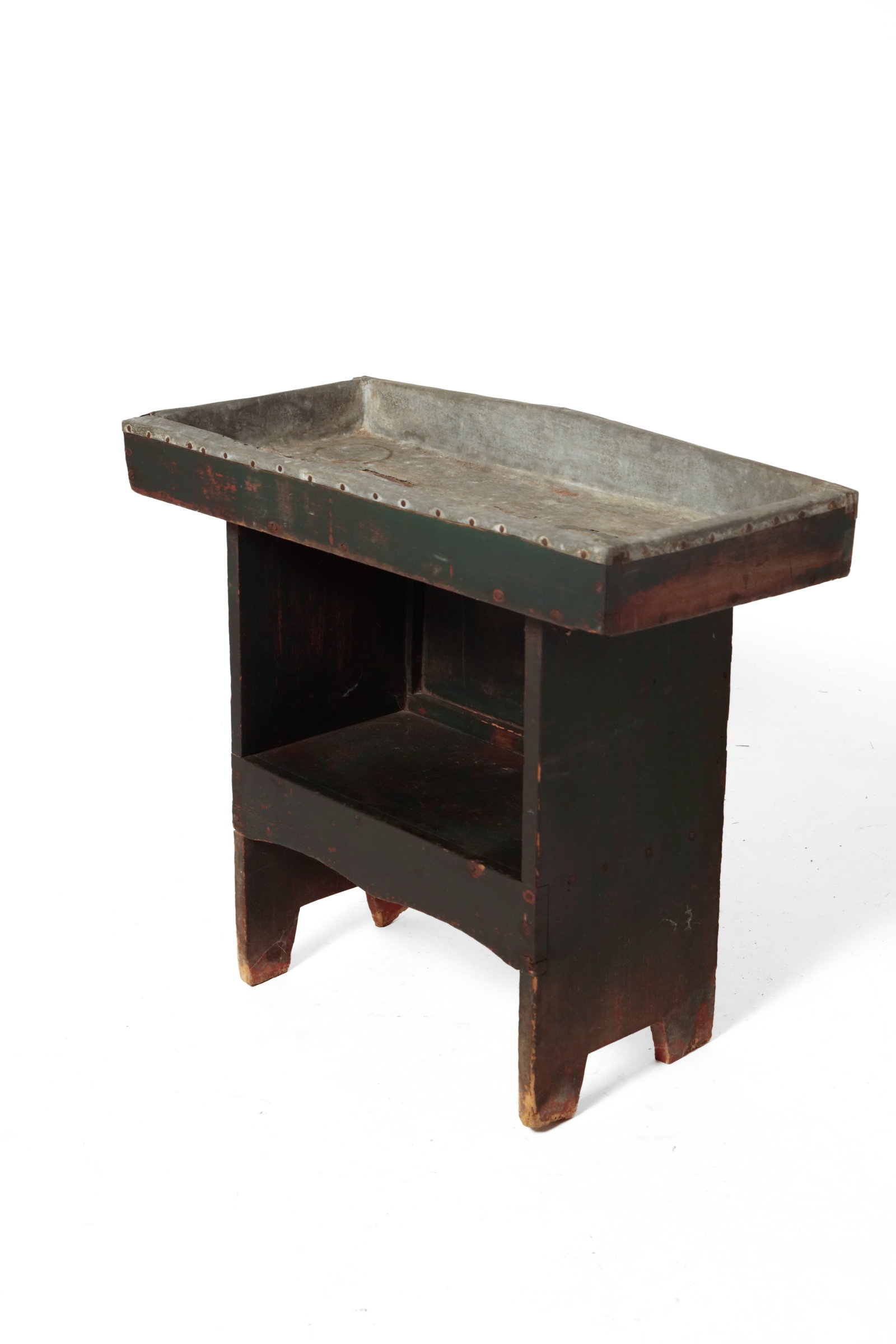 DIMINUTIVE CHILD'S SIZE DRY SINK WITH ORIGINAL DARK GREEN PAINT.: DIMINUTIVE CHILD'S SIZE DRY SINK WITH ORIGINAL DARK GREEN PAINT. American, late 19th Century. Pine. Well with tinned liner, generous overhang, base with simple cut out ends, and lower shelf with