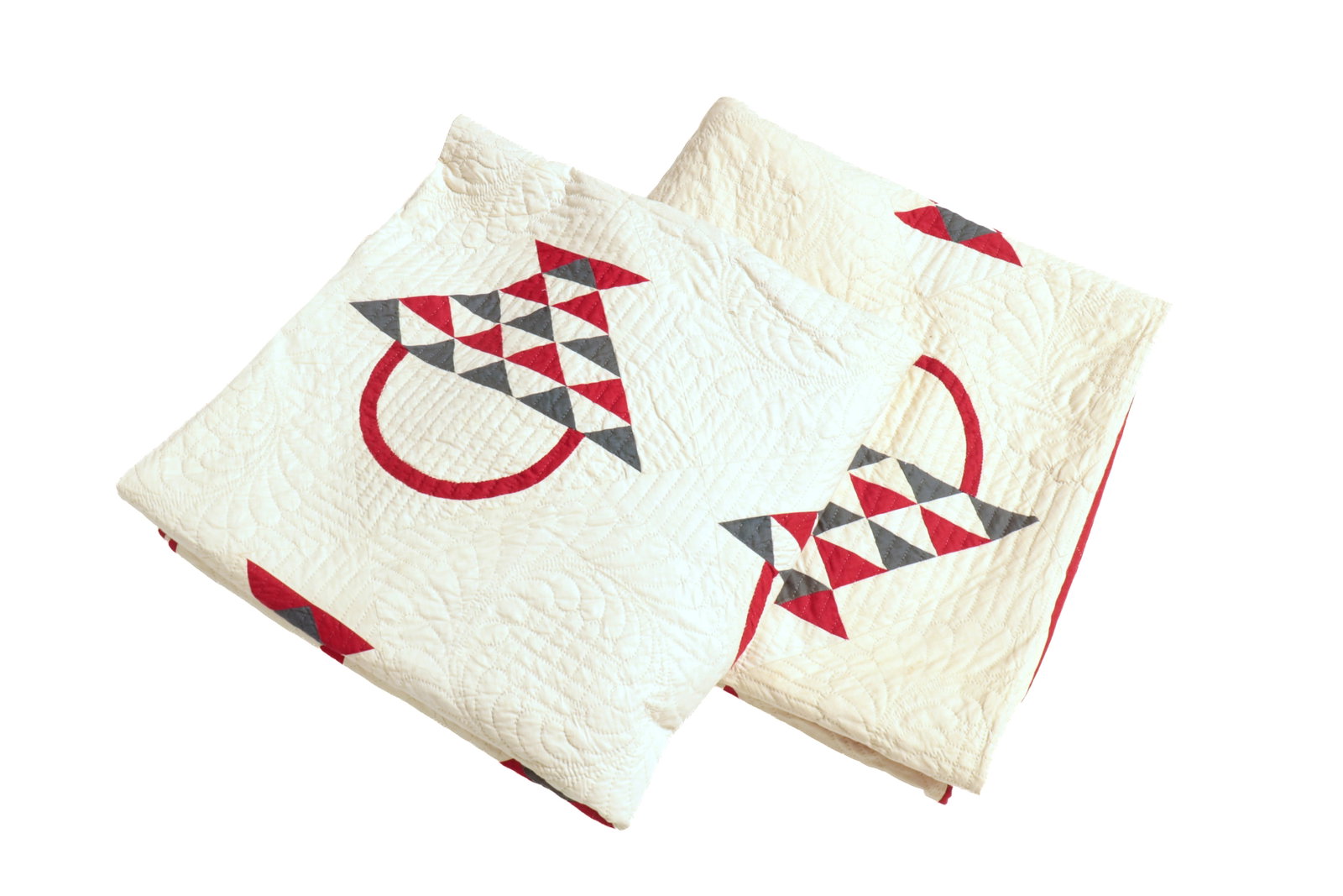 PAIR OF HAND-STITCHED BASKET MOTIF QUILTS.: PAIR OF HAND-STITCHED BASKET MOTIF QUILTS. American, late 19th or early 20th Century. Cotton. White quilted ground, filled with red and blue baskets, a pinked edge, and wrapped edge binding. 78"w. 77"