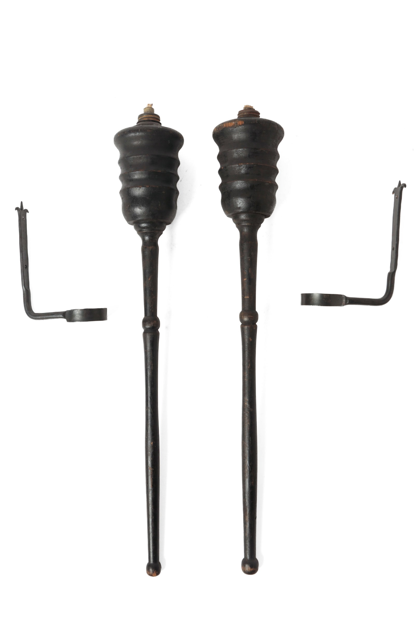 PAIR OF PAINTED CAMPAIGN TORCHES WITH IRON HANGERS.: PAIR OF PAINTED CAMPAIGN TORCHES WITH IRON HANGERS. American, late 19th or early 20th Century. Turned wooden torches with fluid-burning lamps, long tapered handles, and wrought iron hangers with fleur