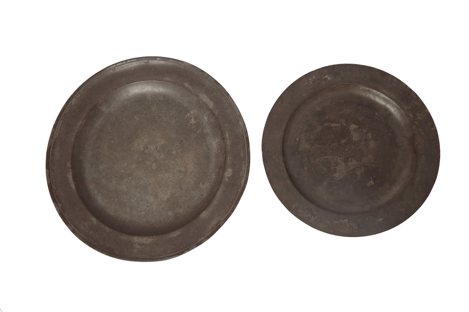 TWO PEWTER CHARGERS. - 2