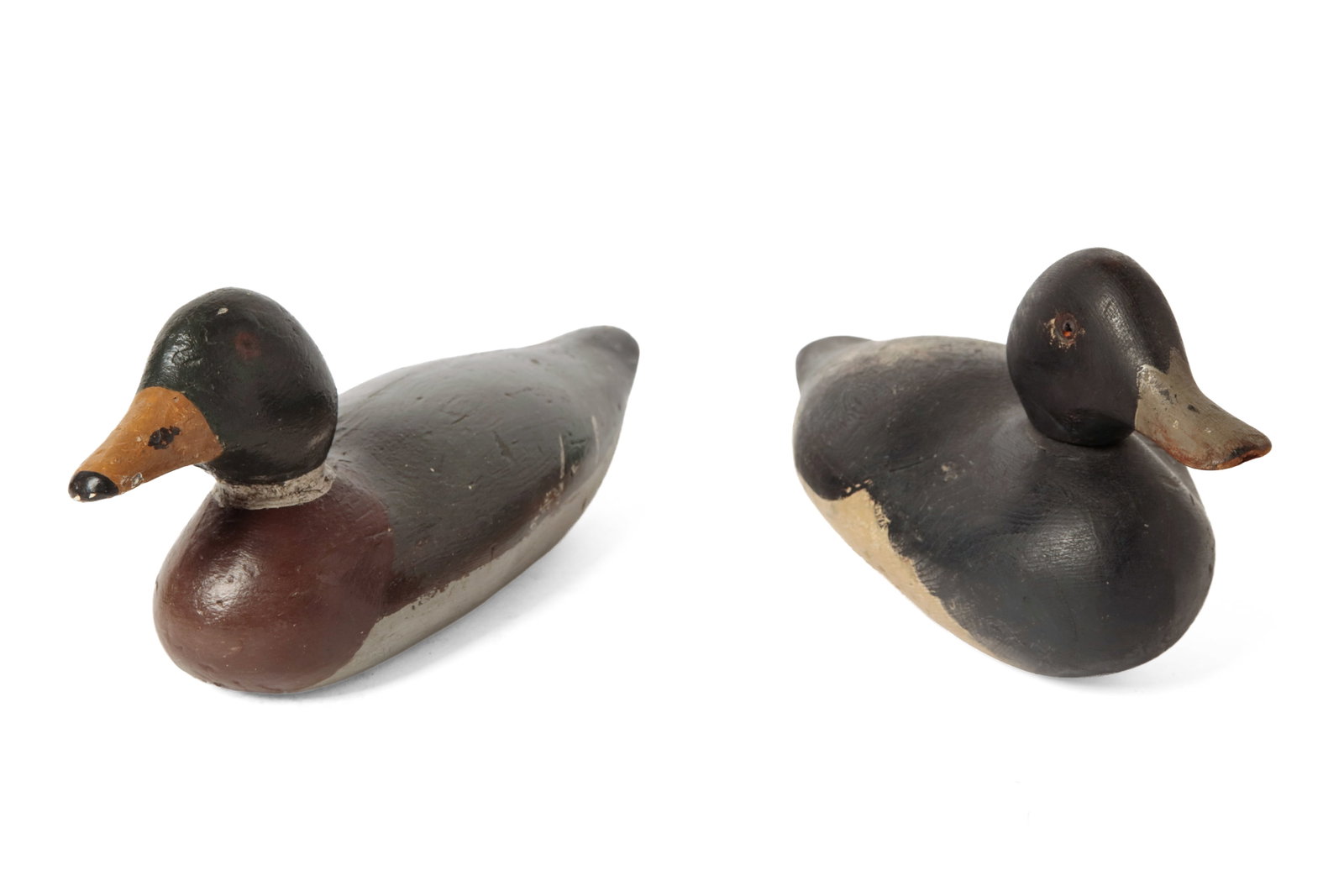 TWO CARVED AND PAINTED WORKING DUCK DECOYS. (1 of 8)
