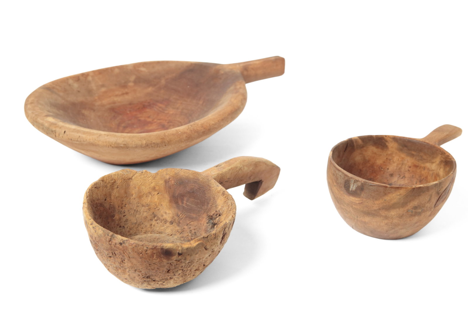 TWO BURL DIPPERS AND A LARGE WOODEN DIPPER.: TWO BURL DIPPERS AND A LARGE WOODEN DIPPER. American and likely European, 19th Century. Carved burl wood dippers having deep bowls, the larger with a long arched handle with hook at end and the