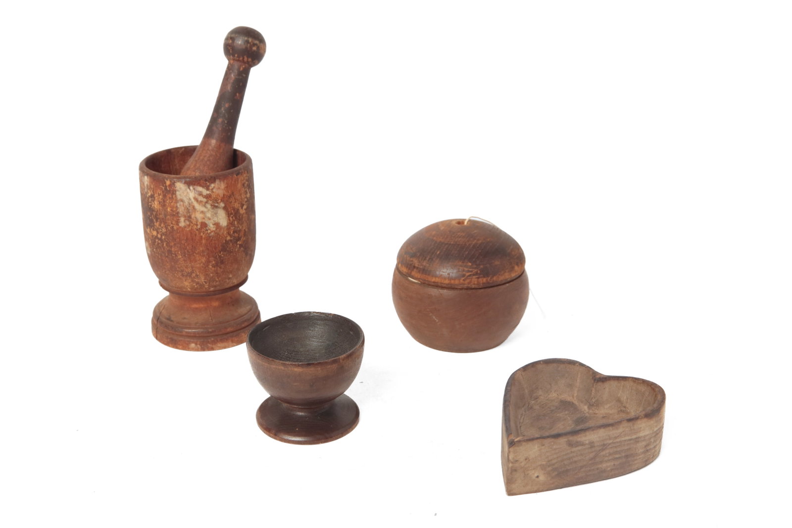 GROUP OF FOUR TREEN ITEMS, INCL. HEART DISH.: GROUP OF FOUR TREEN ITEMS, INCL. HEART DISH. American, 19th Century. Turned wood mortar with flared foot and traces of old paint and turned pestle with black paint on handle. Mortar, 5"h. Pestle,