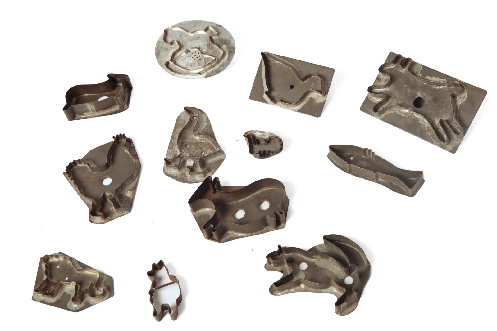 GROUP OF TINNED SHEET METAL COOKIE CUTTERS, MOSTLY ANIMAL FORMS. (1 of 7)