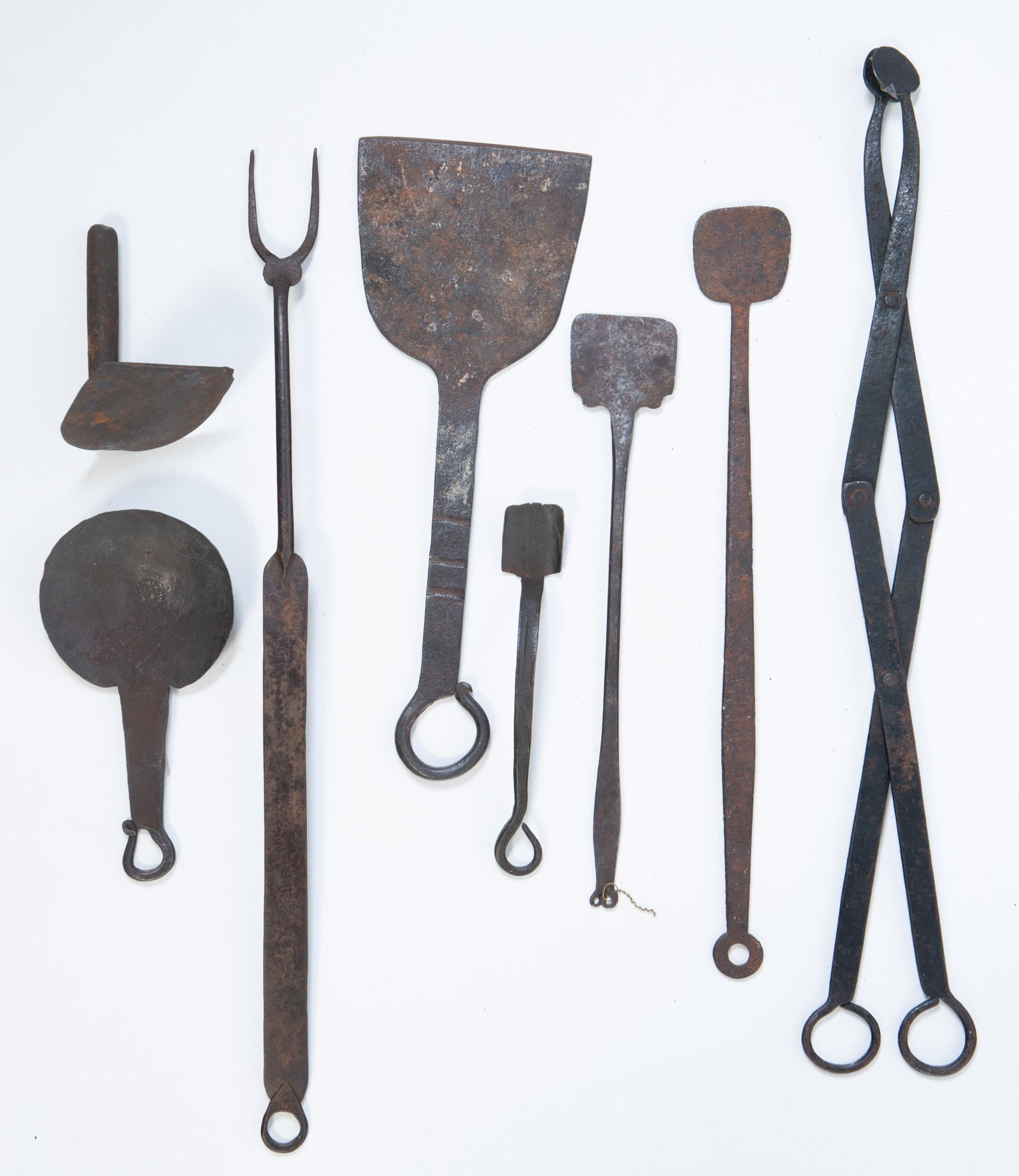 COLLECTION OF EIGHT HAND-FORGED KITCHEN UTENSILS. (1 of 4)