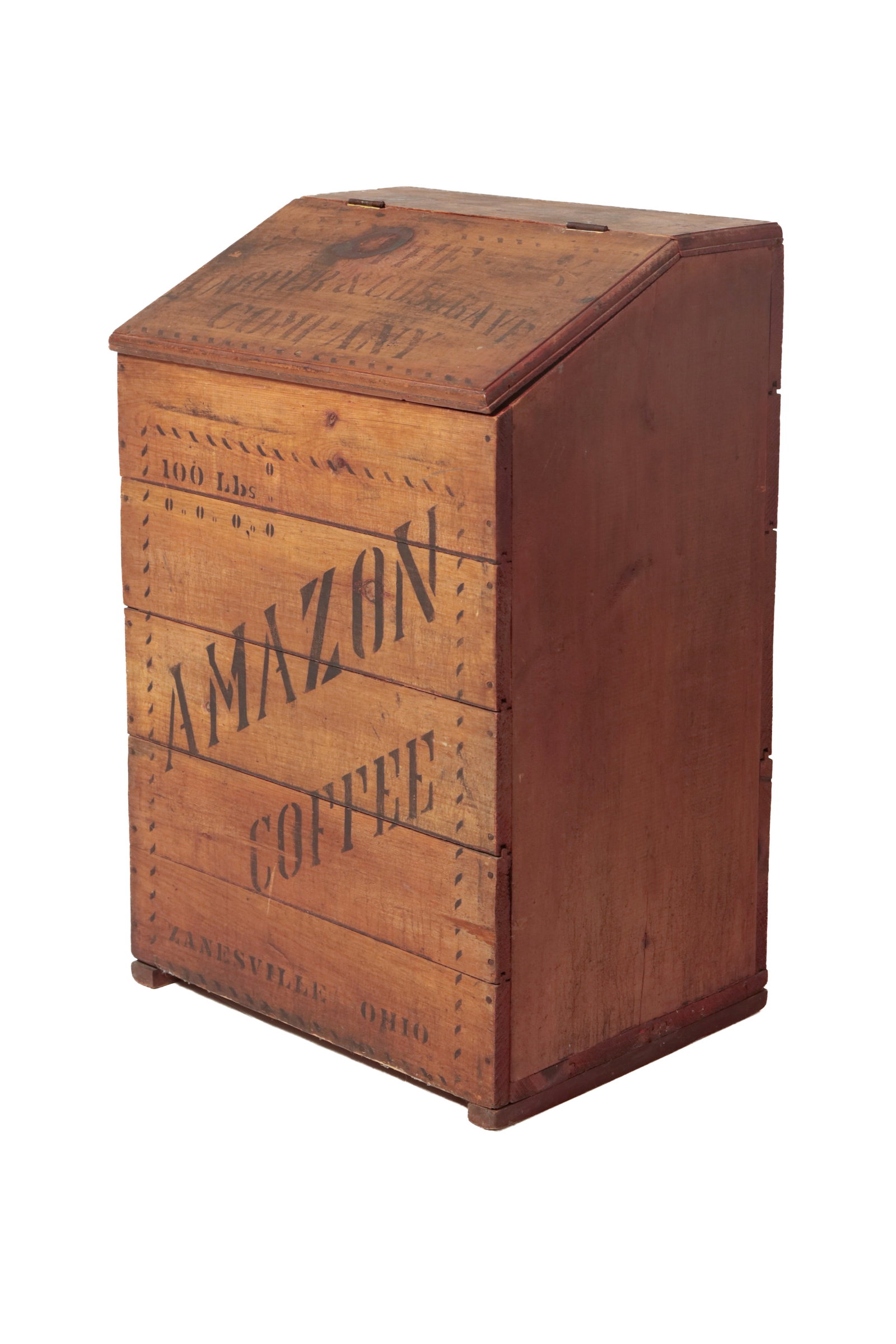AMAZON STENCILED COFFEE BIN.: AMAZON STENCILED COFFEE BIN. American, late 19th Century. Pine. Hinged slanted lid, lid stenciled "Harper & Cosgrere Company" and front stenciled "100 lbs, Amazon Coffee, Zanesville, Ohio". 37.5"h.