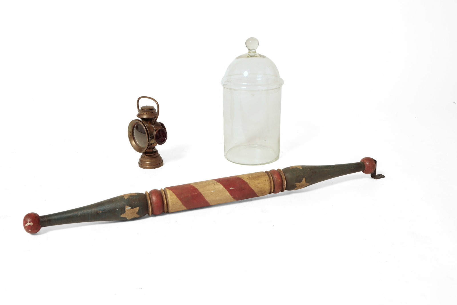 PATRIOTIC PAINTED BARBER POLE, AUTOMOBILE LANTERN, AND APOTHECARY JAR.: PATRIOTIC PAINTED BARBER POLE, AUTOMOBILE LANTERN, AND APOTHECARY JAR. American, 20th Century. Turned and painted pine barber pole, the middle section having red and white stripes and the the ends