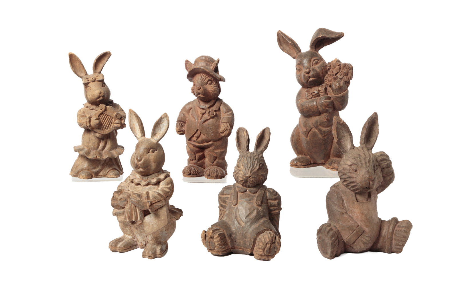 SIX CARVED SOLID WOOD PAPIER-MACHE MOLDS OF RABBITS IN COSTUME. (1 of 20)