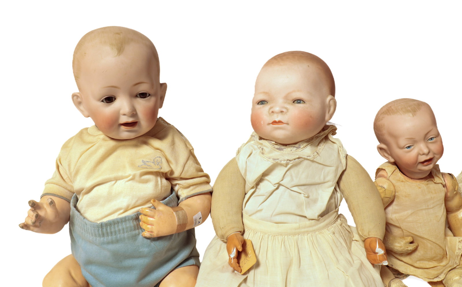 SIX BISQUE HEAD DOLLS. - 2