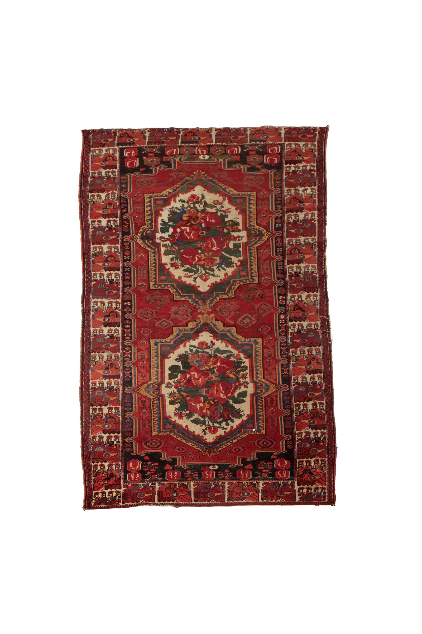 PERSIAN BAKHTIARI WITH A GOL FARANG DESIGN.: PERSIAN BAKHTIARI WITH A GOL FARANG DESIGN. Persian, first half 20th Century. Wool. Elaborate central floral medallions, surrounded by geometric shapes, and framed by multi-layered stylized floral bor