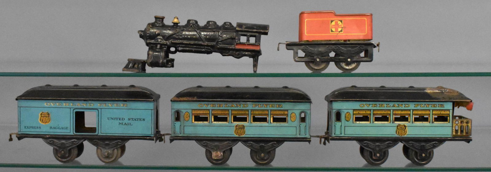 Hafner prewar O gauge Overland Flyer Union Pacific: Includes cast iron steam locomotive shell ONLY, Santa Fe tender with Union Pacific passenger cars consisting of baggage / mail, coach and observation cars, C5-6.