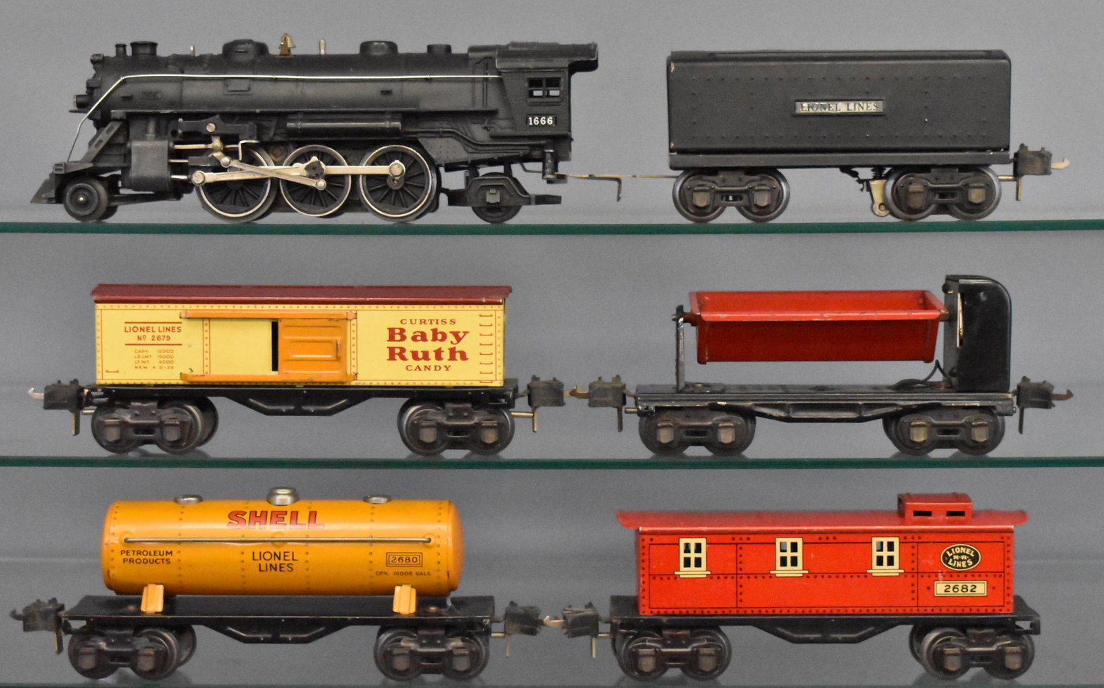 Lionel prewar O gauge steam freight set 1666 2689W 2679: Includes 1666 steam locomotive, 2689W tender, 2679 box car, 2680 tank car tank car, 3659 automatic dump car dump car and 2682 caboose, C6.
