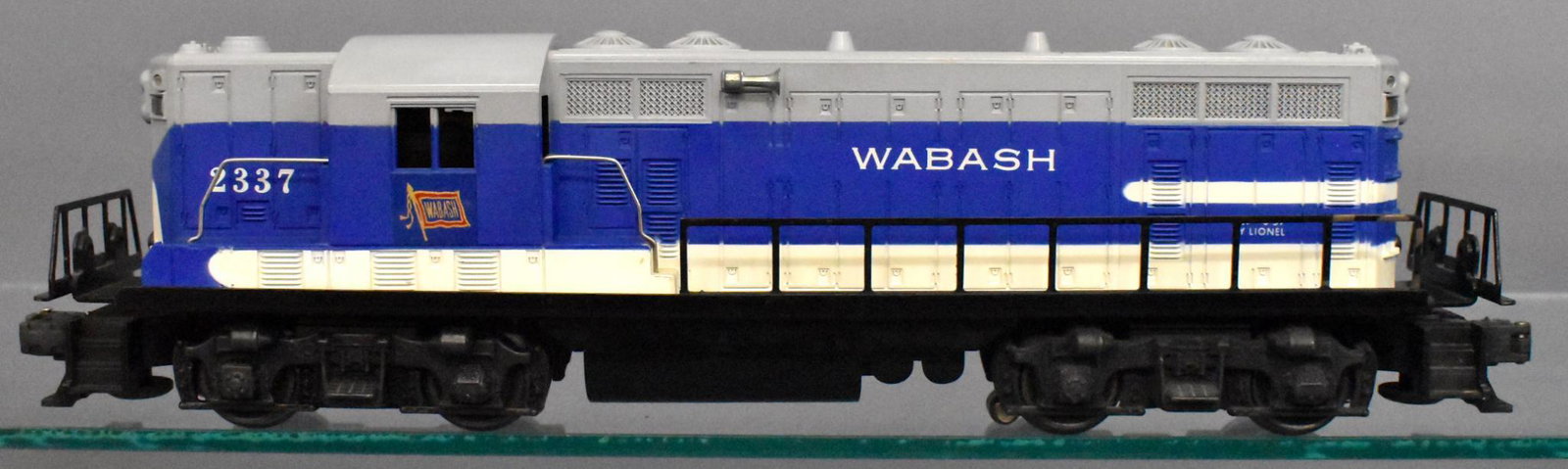 Lionel postwar O gauge 2337 Wabash GP-7 diesel: Unit has moderate run time but is very clean and C7 with no screw cracks and no battery damage.