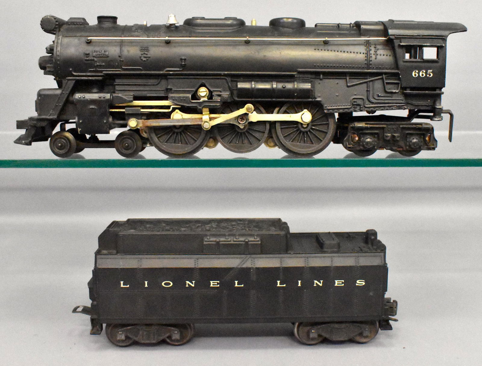 Lionel postwar O gauge 665 steam locomotive with 6026W: Locomotive and tender show considerable run time but are clean and C5-6.