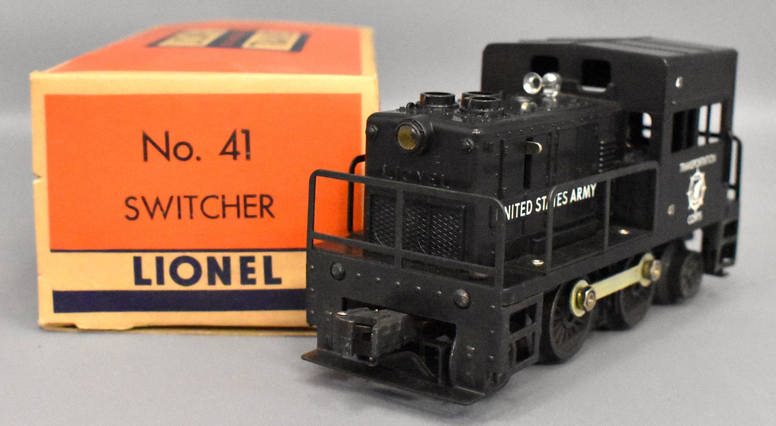 Lionel postwar O gauge 41 US Army switcher in original: Nice unit with light run time and very clean with no cracked window struts, C7 with a nice original box that is missing the insert.