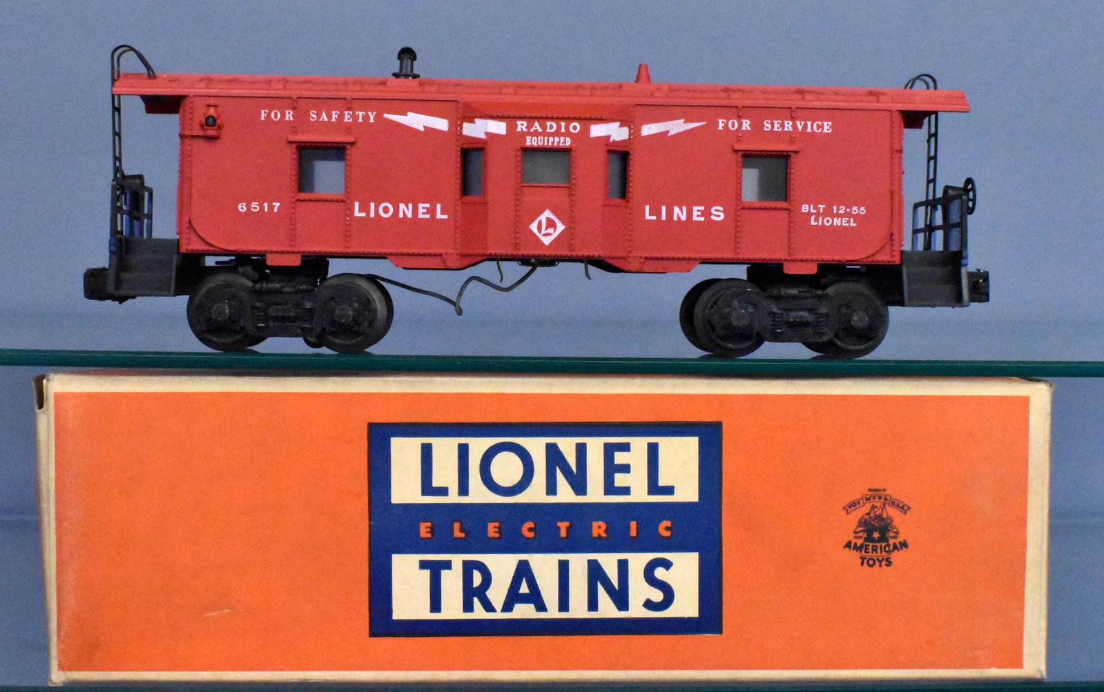 Mint Lionel postwar O gauge 6517 bay window caboose in: Cra is unruan and super clean, C9 with a brick original box that has red written on one end flap.