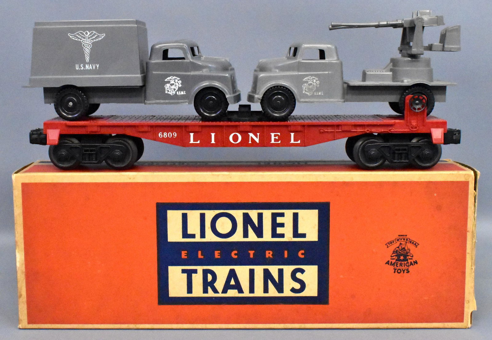 Unrun Lionel postwar O gauge 6809 flat car w/ Pyro: Car is unrun and C8-9 and includes two original pro units that are nice and clean with no damage. The original box has inner tape repairs on all flaps on one end but is complete, solid and square.