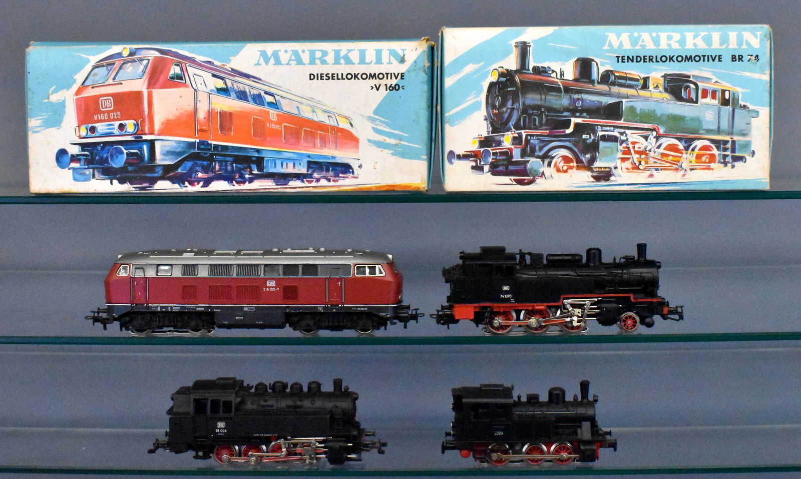 Four Marklin HO locomotives with two original boxes: Includes boxed 3075 diesel locomotive and 3095 tank locomotive plus loose 3029 and 81004 tank locomotives, C7 with two good original boxes.