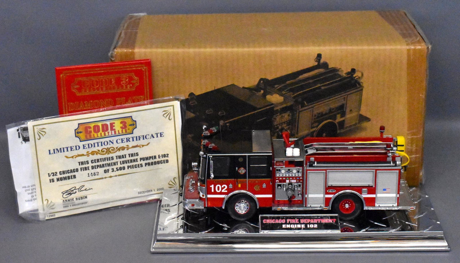 Code 3 1/32 die cast Chicago Fire Dept Luverne pumper: Code 3 Chicago fFire Dept Luverne pumper with original box 1/32 12982. Truck is near mint with a near mint original box truck may have some dust from being displayed.
