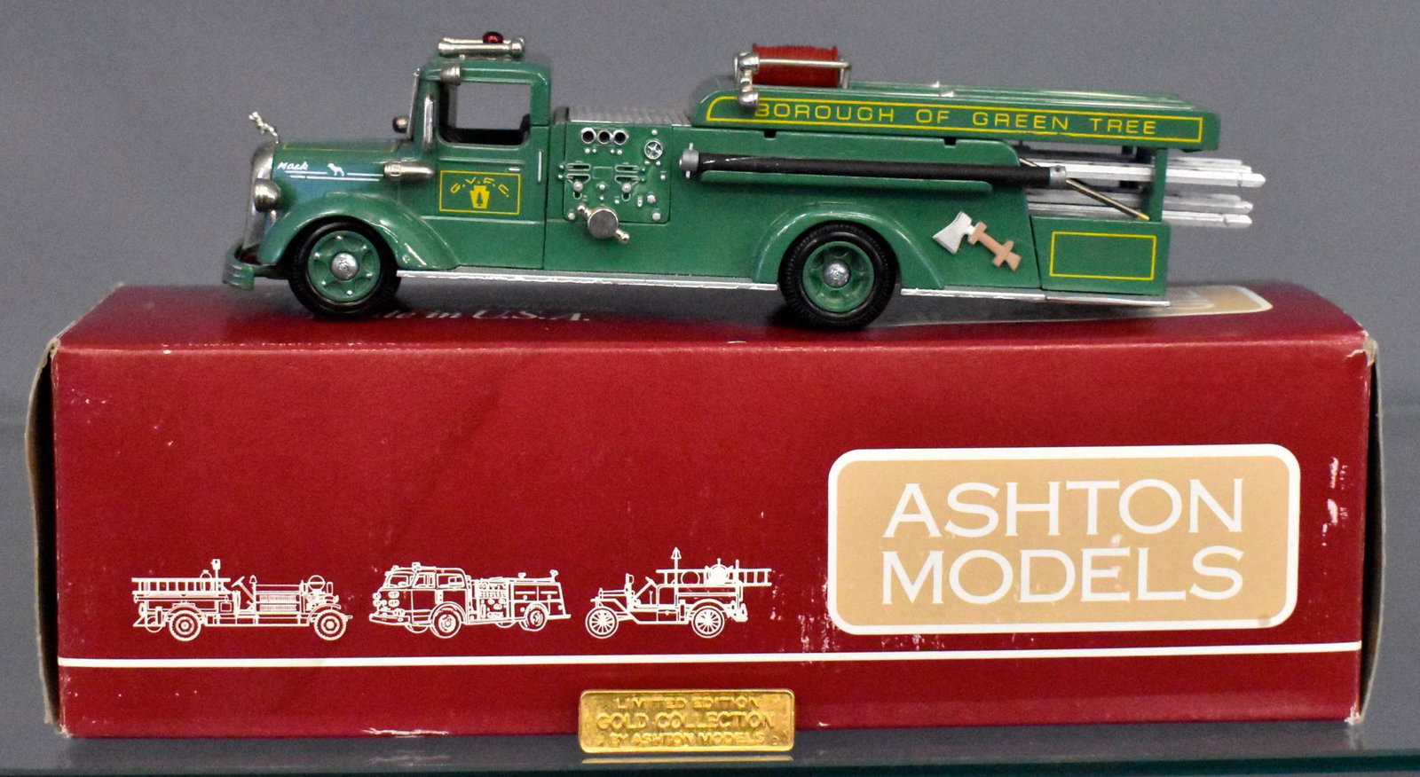 Ashton Models die cast 32G 1950 Mack 85LS Green Tree: Ashton Models 1950 Mack 85LS Green Tree Fire Truck in an excellent original box. 85LS Quadruple Combination "Green Tree" 32G truck is near mint with ladders see photos. Truck may have some dust from b