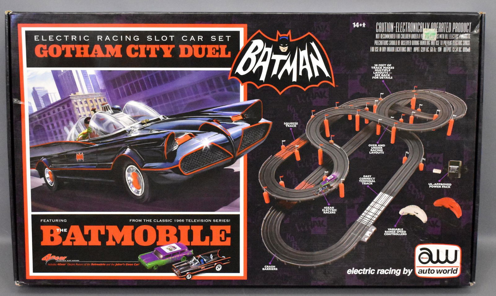 Auto World HO scale Gotham City Duel slot car racing: Auto World HO scale Gotham City Duel slot car racing set, mint in box. Set is like new and complete in an excellent original box. The cars have been taken out of the box but were never removed from th