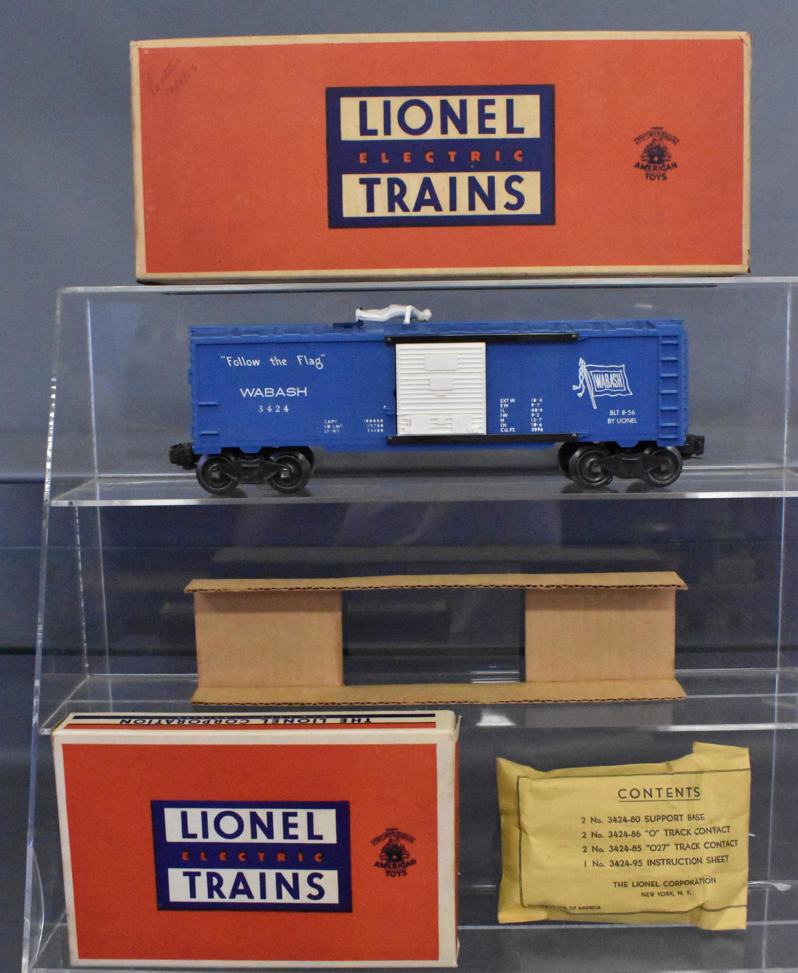 Lionel postwar O gauge 3424 Wabash operating brakeman: Lionel postwar O gauge 3424 Wabash operating brakeman car in original box. Car appears unrun but the wheels were oiled and possibly polished, C8 with 3424-100 low bridge signal set, 3424-94 operating 