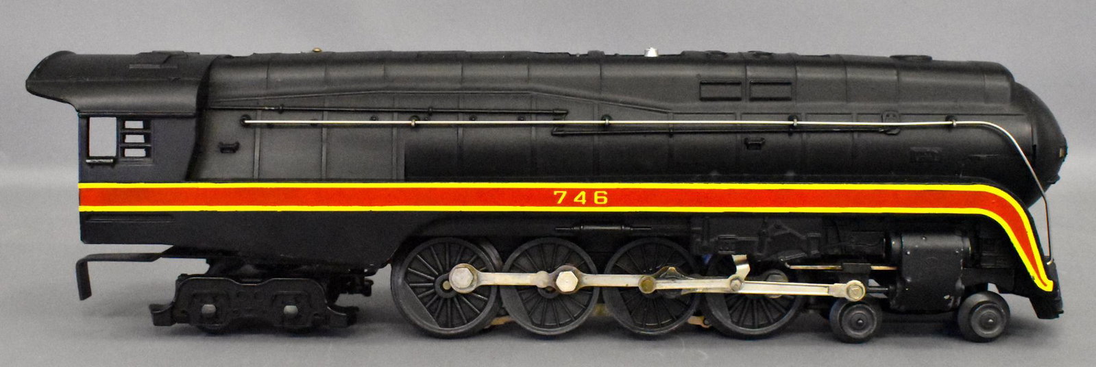 Lionel postwar O gauge 746 N&W J steam locomotive: Lionel postwar O gauge 746 4-8-4 Norfolk & Western J steam locomotive. Locomotive shows moderate run with some paint loss from the steam chests but the rest of the boiler is exceptionally clean. Displ