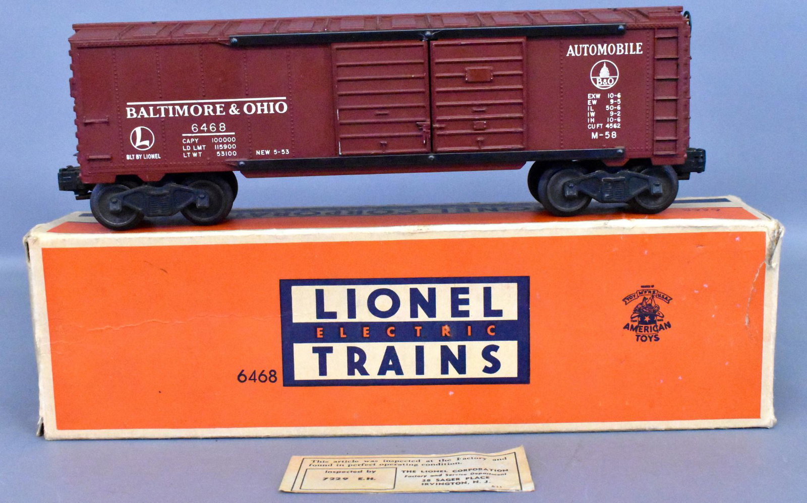 Lionel postwar O gauge 6468 Tuscan B&O double-door box: Lionel postwar O gauge 6468 Tuscan B&O double-door box car in correct 6468X original box. Car shows moderate run time and looks great from the sides but has two small chips from the catwalk and a chip