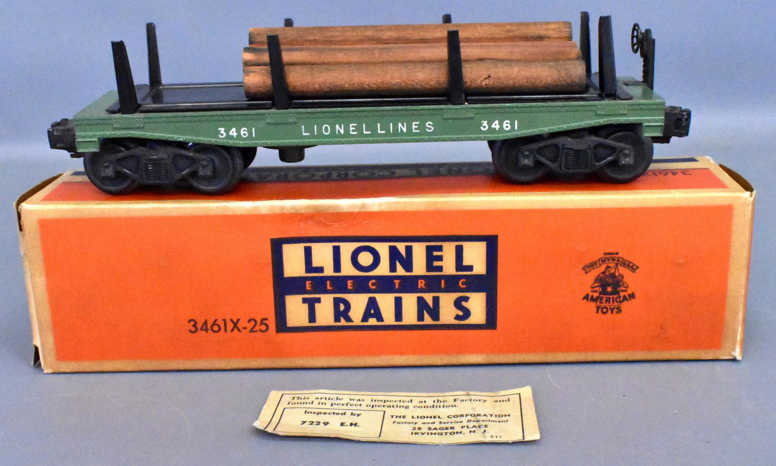 Lionel postwar O gauge 3461X-25 automatic lumber car in: Lionel postwar O gauge 3461X-25 automatic lumber car in original box. Car shows moderate run time but is extremely clean, C8 with five stained logs, an original inspection slip and an excellent origin