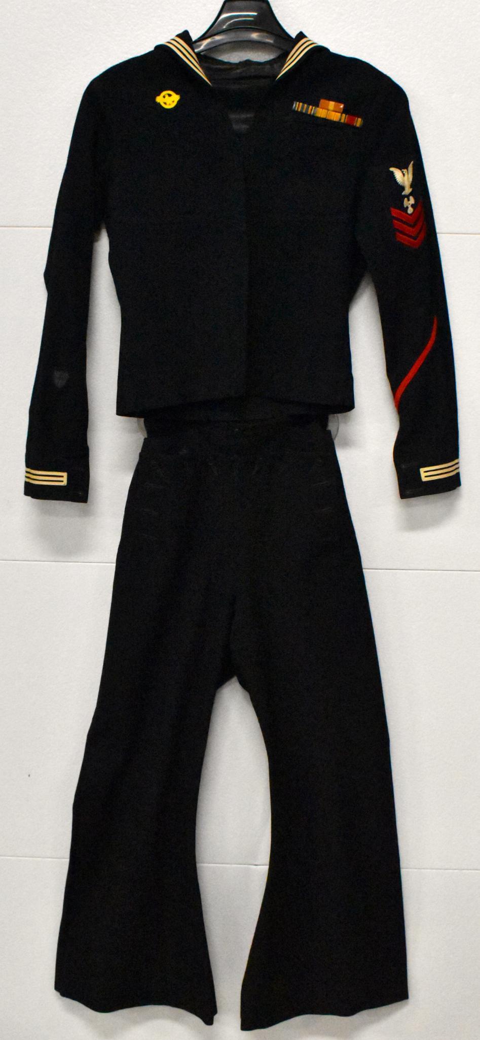 WWII US Coast Guard Uniform of CPO Chief Petty Officer: WWII US Coast Guard Uniform tunic and pants named to CPO Chief Petty Officer First Class Machinist Mate B. F. Thornton Name is hand stitched inside. Very good condition.