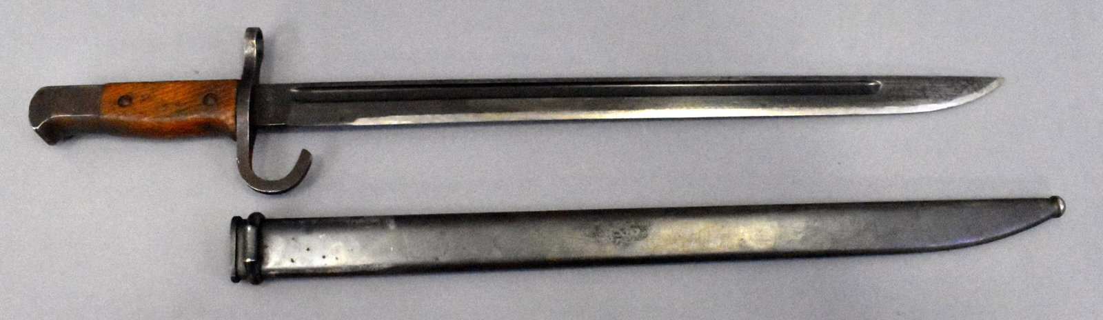 WWII Japanese Type 30 Bayonet and scabbard for Arisaka: WWII Japanese Type 30 Bayonet and scabbard for Arisaka Rifle, blued blade, hooked quillion. Excellent blade and scabbard Combat sharpened. Labar book LB-107
