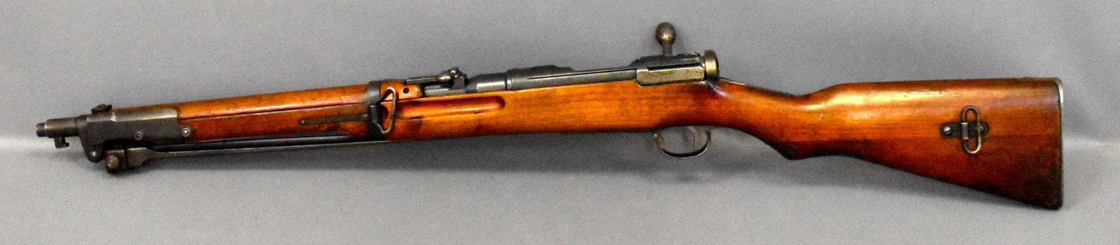WWII Japanese Type 44 6.5 mm cavalry rifle Kokura: WWII Japanese Type 44 6.5 mm cavalry rifle Kokura Arsenal Series 1 with folding bayonet. Scarce model. 3rd type bayonet housing. High excellent condition overall with some minor wood marks. Transfer o