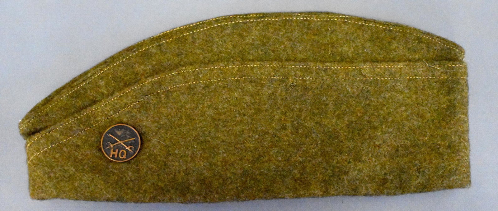 US WWI Army Overseas Cap British Made 1919 Cavalry HQ: US WWI Army Overseas Cap British Made Empire Cap Works dated 1919 with Broad Arrow stamps Size 7 1/2 with Cavalry HQ cap device.