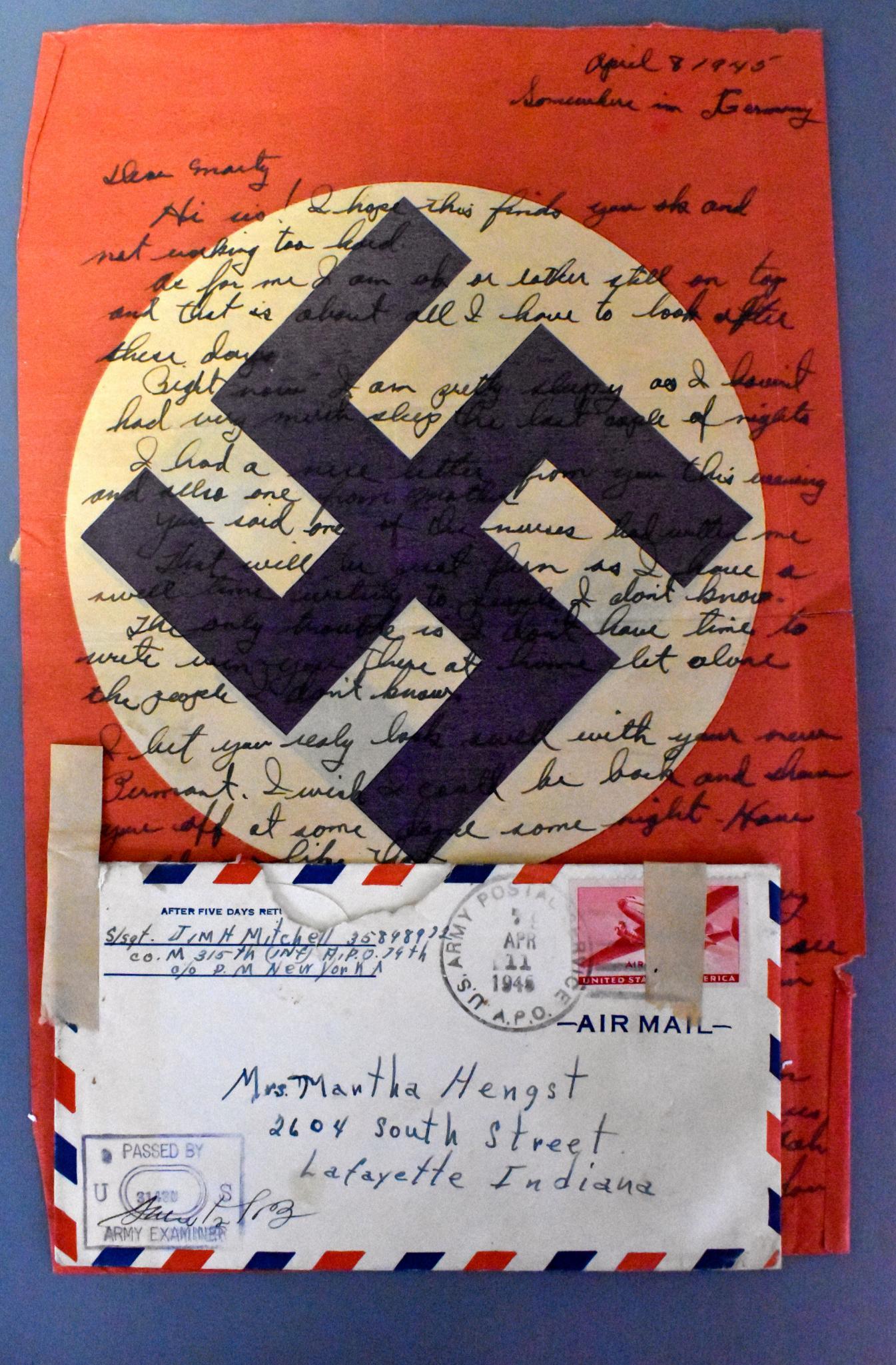US WWII military letter home written on German Nazi: US WWII military letter home written on German Nazi paper flag or banner dated April 1945. Unusual and neat item.