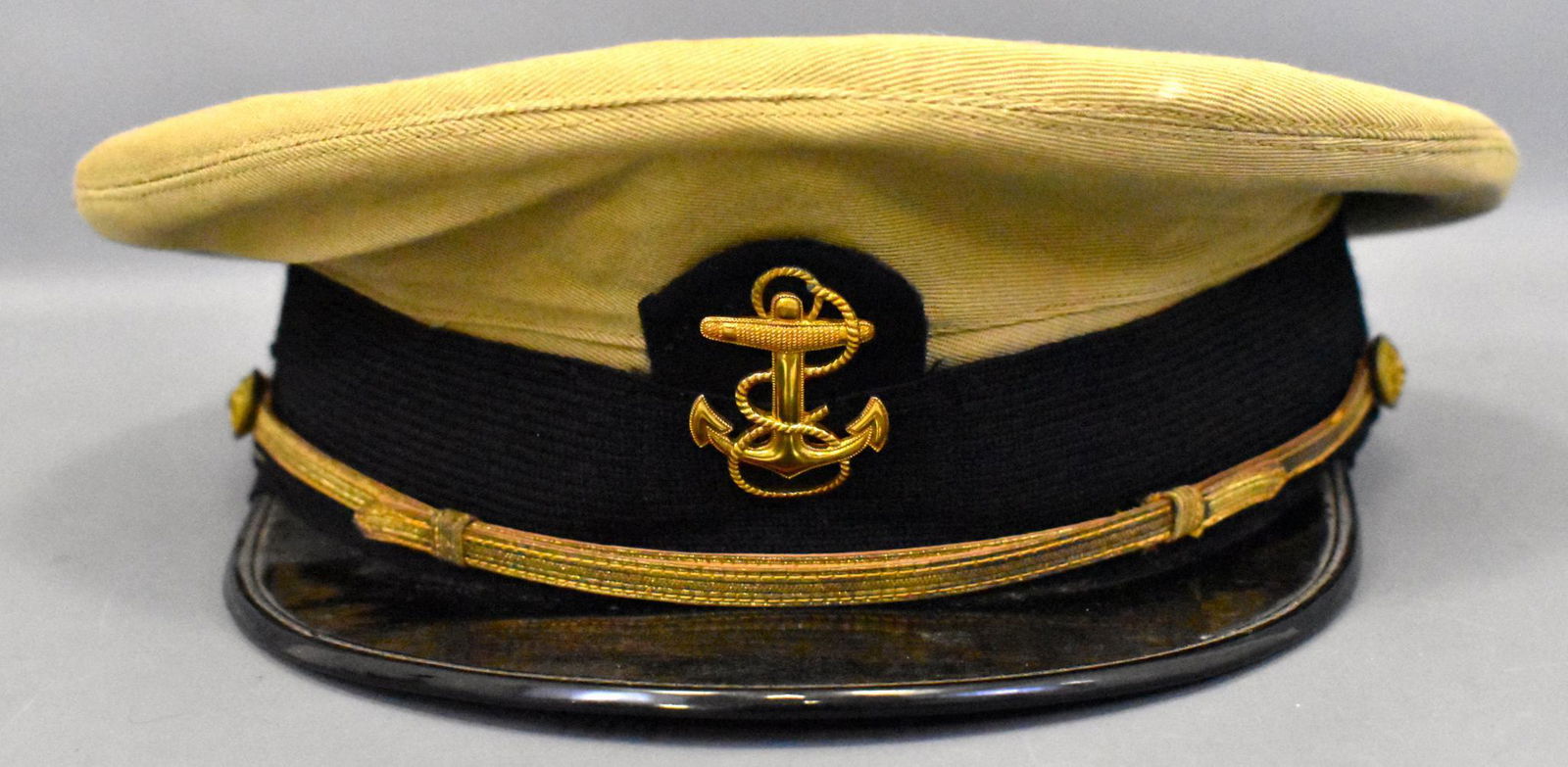WWII military US Navy cadet uniform tan hat L Newtson: WWII military USN US Navy cadet uniform tan dress cap hat. Named to L. Newtson BOQ NAS Corpus Christi Texas. Size looks to be a 7 to 7 1/2 Excellent condition.